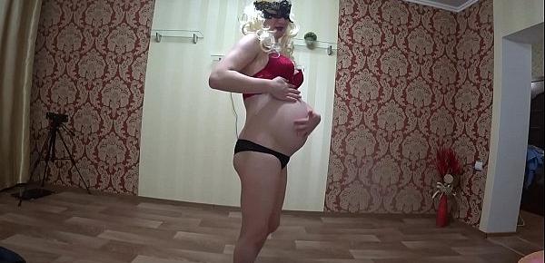  The milf in the early stages of pregnancy shows a striptease, and then fucks with a lesbian. Juicy ass in panties POV.
